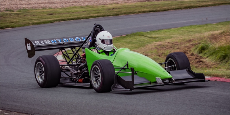 Force racing car competing on a hill climb